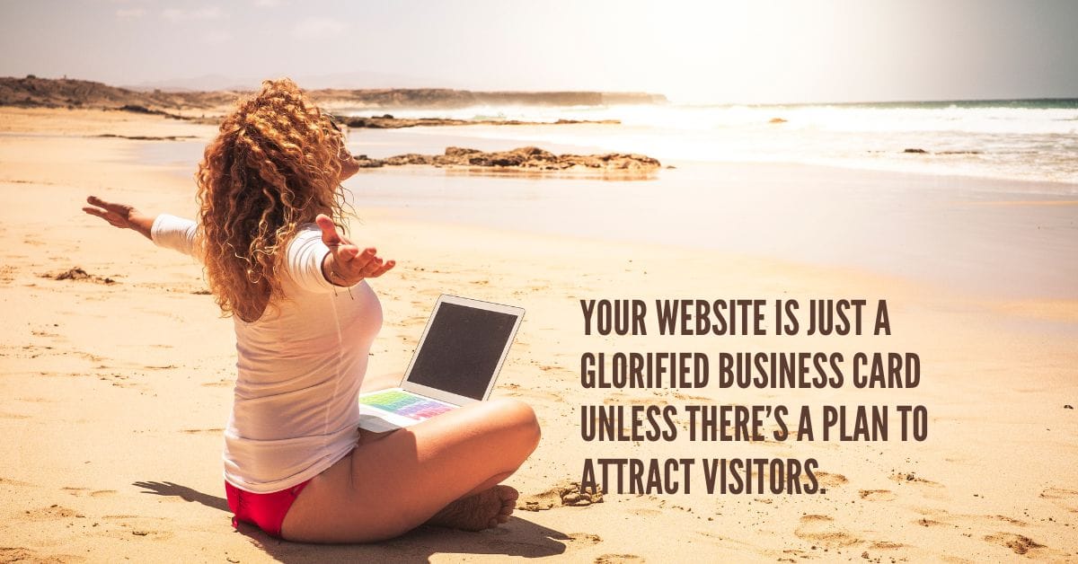 A woman sitting on a beach with a laptop, representing the freedom and success achievable with a well-optimized site. Learn how to get traffic to your website.