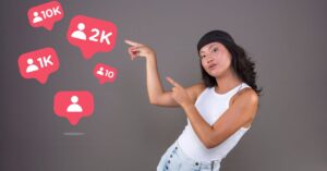Woman pointing toward floating social media follower icons showing counts including 10K, 2K, 1K, and 10.