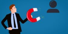 Illustration of a businessman holding a red magnet that attracts a customer icon, representing customer attraction.