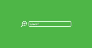 An illustration of a search bar on a green background. The search bar contains the word "search" and is accompanied by a magnifying glass icon with a heart in the center, symbolizing a search function that focuses on user preferences or interests.