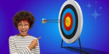 Woman pointing excitedly at arrows hitting a target, representing a focused influencer outreach strategy.