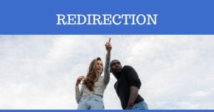 Two people looking and pointing upward beneath the word “Redirection.”