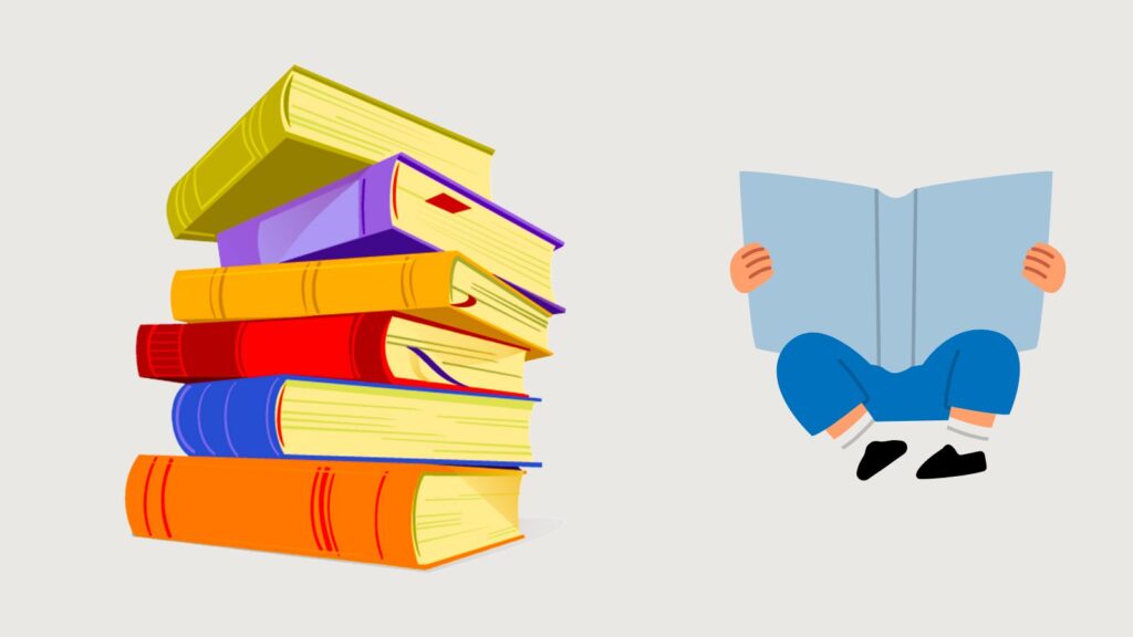 A bunch of books – representing the best business books – next to a person reading a book