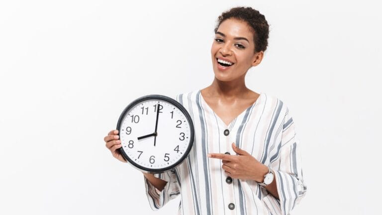 A woman holding a clock, symbolizing time as a valuable resource