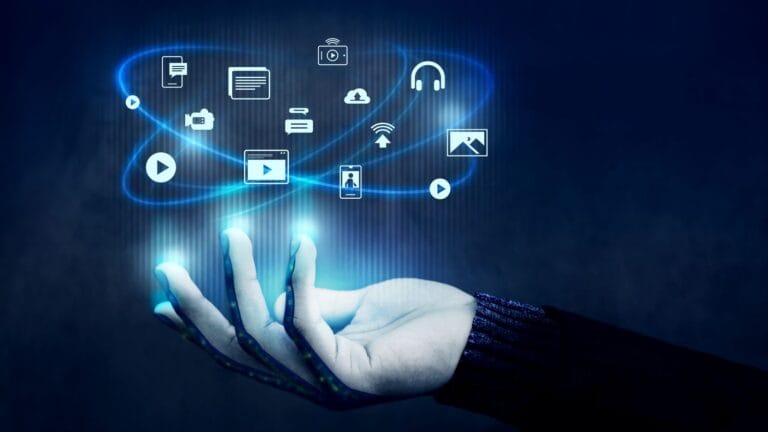 A hand appears to be interacting with and controlling a variety of floating digital icons that represent different media and connectivity options — content marketing vs digital marketing