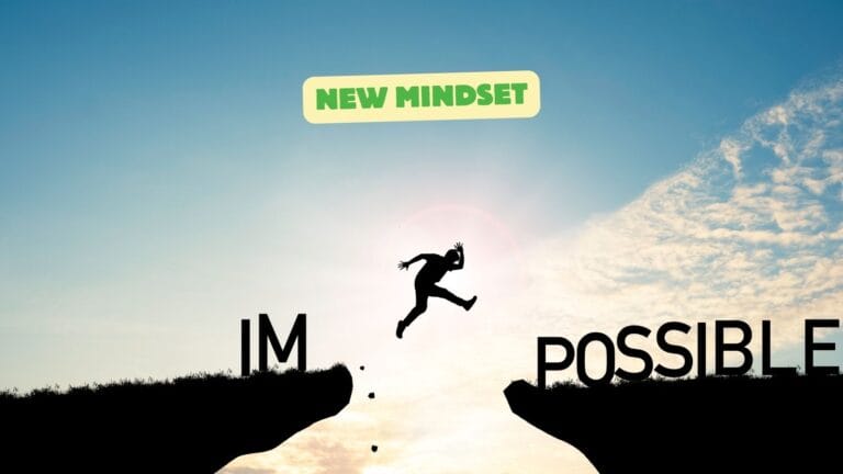 A silhouetted figure leaps across a gap between two cliffs under a sunrise, symbolizing the transformative power of adopting a new mindset for business to turn the impossible into possible.
