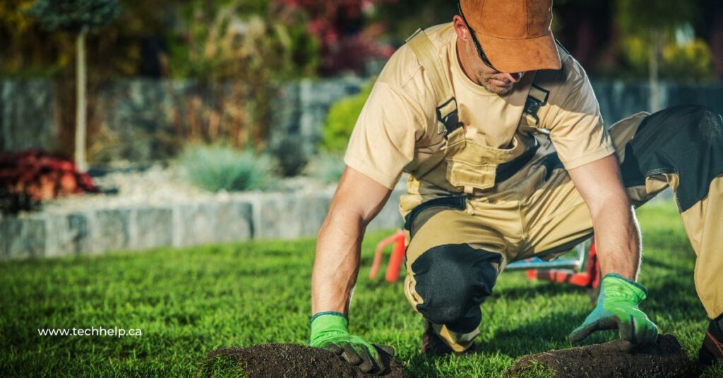 A landscaper in overalls and gloves carefully laying down new sod in a lush garden, showcasing his expertise and attention to detail - an ideal example of effective landscaping advertising.