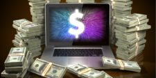 A laptop with a glowing dollar symbol on the screen is surrounded by stacks of cash, symbolizing financial growth. The image represents the concept of generating passive income, aligning with the title '25 Ways to Make Money While You Sleep.