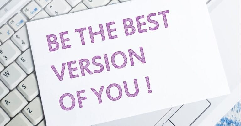 Motivational stoic quotes encouraging personal growth, with 'Be the Best Version of You!' displayed on a card over a keyboard.