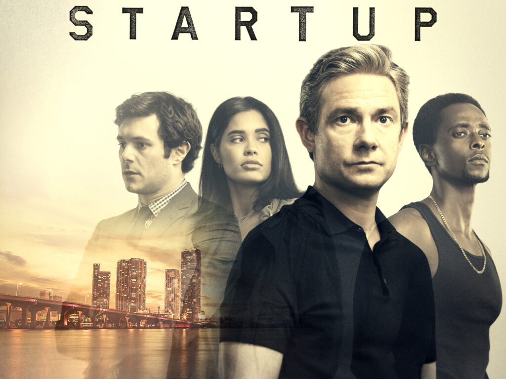 Promotional image for the series "StartUp," with the cast standing in a cityscape backdrop, highlighting the drama and tension around the creation of a tech company.