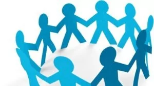 A circle of connected blue paper-cut figures symbolizing community, collaboration, and active participation.