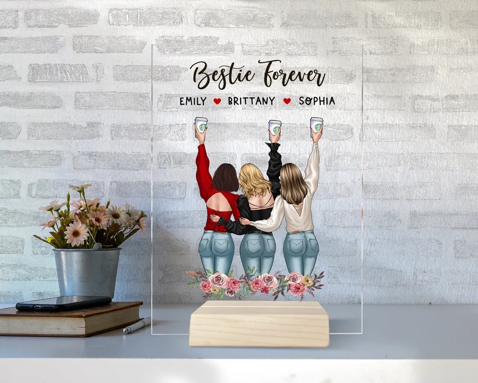 Personalized acrylic plaque with three friends, text "Bestie Forever," and floral base.