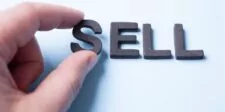 How To Find Products To Sell (Sell What Shoppers Want) "Hand arranging letters to spell 'SELL' on a light background."