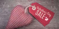 Red fabric heart with Valentine's Day Sale tags.