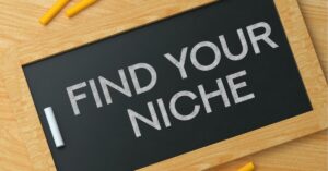 Chalkboard with the phrase "Find Your Niche" written on it.