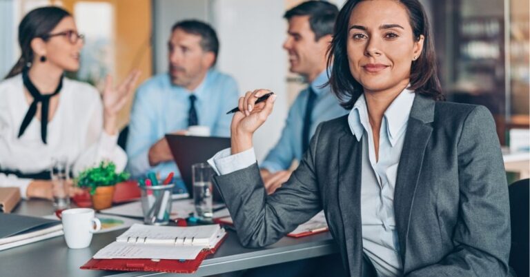 Confident businesswoman leading a team meeting.