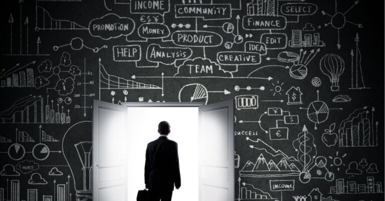 Businessman walking through open doors into bright light, surrounded by chalkboard drawings of business concepts.