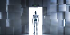 How to Create an Elevator Pitch That Opens Doors Robot standing at an open elevator, facing forward.