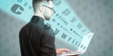Man with laptop surrounded by floating words "Copywriting."