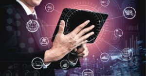 Laptop with charts on the screen.