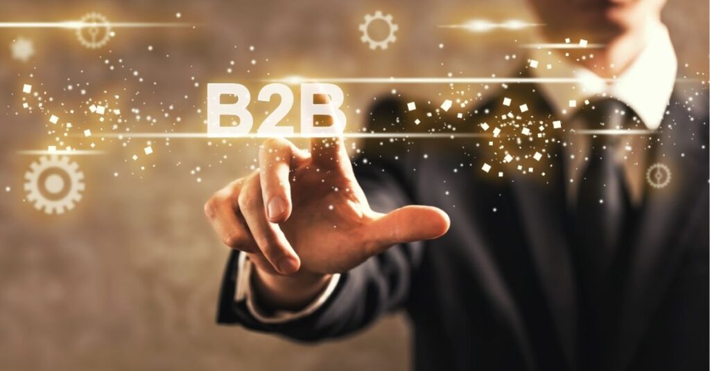 Person analyzing colorful charts on a computer monitor