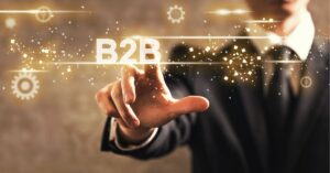 Person analyzing colorful charts on a computer monitor