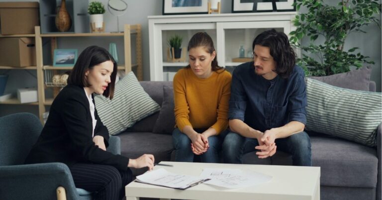 Creative Brainstorming: Group of people discussing ideas at a conference table.
