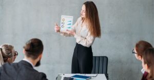 Colleagues collaborating on a project with laptops