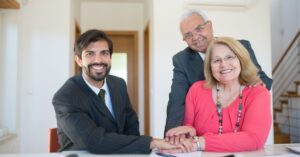 "Person holding a smartphone with social media app open, surrounded by icons of engagement tools."