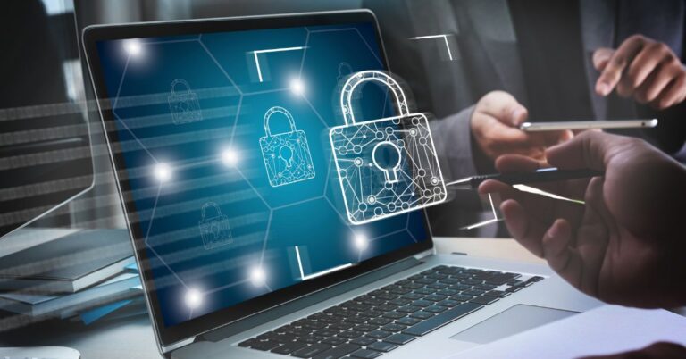 Laptop screen showing digital padlock icons with people working in the background, symbolizing how proxies improve online security for small businesses.