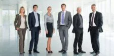 IPO Calendar Guide: How Public Offerings Work and What to Watch in The Pipeline Business professionals standing in a bright modern office