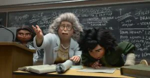 Scene from Hoppers showing a professor and Mabel leaning over a desk in front of a chalkboard filled with notes.