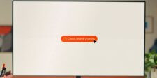 Computer monitor showing a “Check Brand Visibility” button for a HubSpot AEO review.
