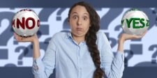 accessiBe review: What nearly five years taught us about this accessibility widget Woman looking uncertain while holding “yes” and “no” decision balls, representing a balanced review of whether accessiBe is worth using.