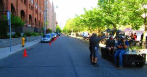 Film crew working on a street set in Toronto during production of the TV series Condor.