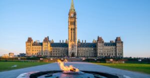 Parliament Hill in Ottawa with the Centennial Flame in the foreground.