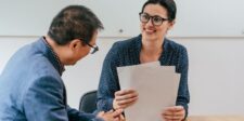 Canada's new procurement rules could put federal contracts within your reach Two business professionals reviewing documents together during a meeting.