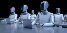 LinkedIn is drawing the line between AI help and AI slop Humanoid robots seated at desks using laptops in a dark workspace.