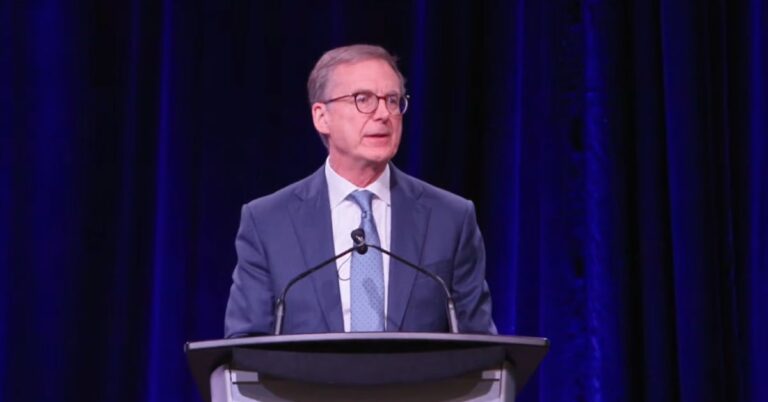 Bank of Canada Governor Tiff Macklem speaking at a podium during a Halifax Partnership event.