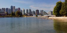 Vancouver skyline viewed across the water from Stanley Park in British Columbia.