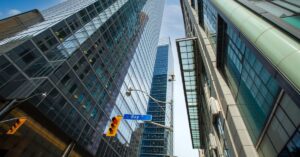 Skyscrapers along Bay Street in Toronto’s financial district viewed from street level.
