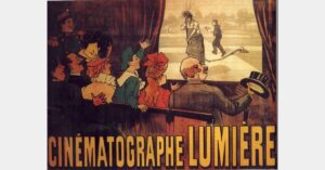 Vintage Cinématographe Lumière poster showing an audience watching an early film projection