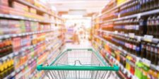 Canadians’ spending plans weaken even as financial confidence improves, Bank of Canada survey finds Shopping cart in a supermarket aisle lined with stocked shelves.