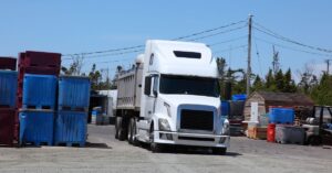 Freight truck at a commercial loading yard, illustrating Canada’s August 2026 merchandise trade surplus and cross-border goods movement.