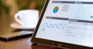 Website analytics dashboard on a tablet, illustrating Google crawling, indexing, and search recovery timelines.