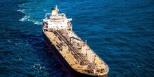 Large crude oil tanker sailing through open water, illustrating surging tanker charter rates and shipping pressure around the Strait of Hormuz.