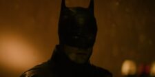 Official camera-test frame from The Batman Part II showing the film’s dark, amber-lit visual style.