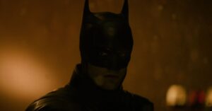 Official camera-test frame from The Batman Part II showing the film’s dark, amber-lit visual style.