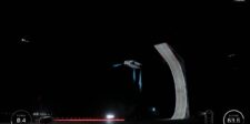 Tesla’s airborne Roadster demo leaves big road-legal questions behind Tesla Roadster prototype hovering beside a curved stunt ramp during a nighttime demo, with blue thruster plumes and an altitude readout visible.