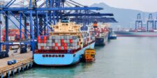 U.S.-bound freight demand stays firm as shipping costs remain high Container ships loaded with cargo at a major port, illustrating strong U.S.-bound freight demand and elevated shipping costs.